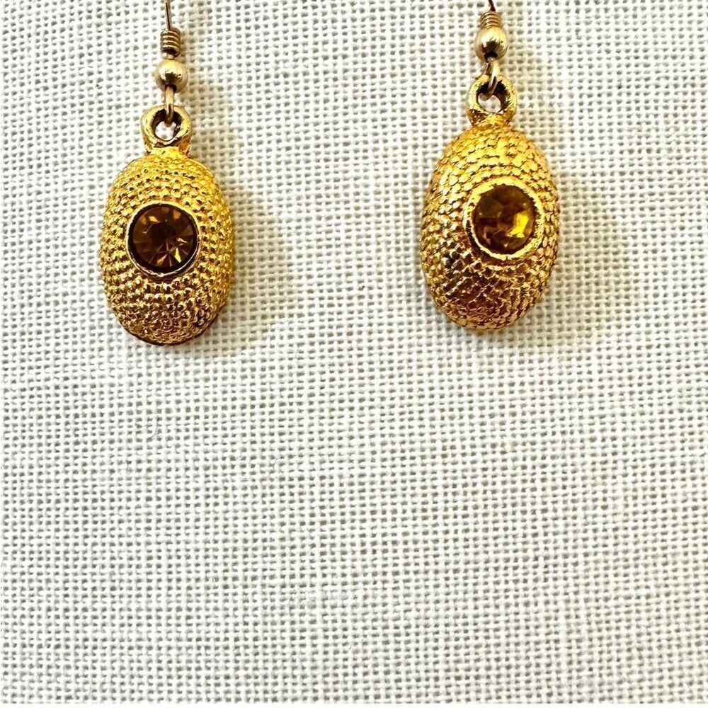 Gold tone yellow rhinestone earrings